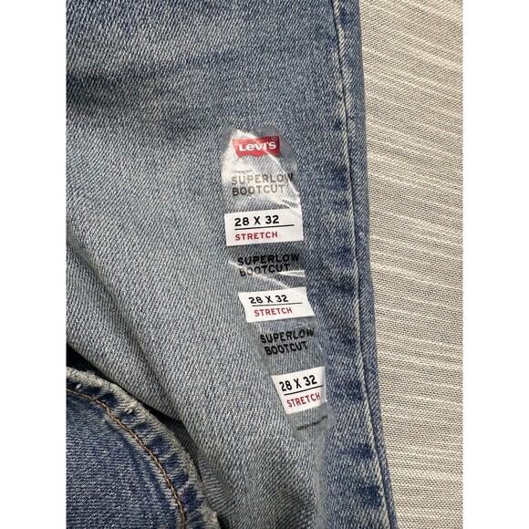 Levi's Women Super Low Bootcut Low Rise Zip Fly Stretch Jeans  28x 32 NWT - Picture 3 of 6